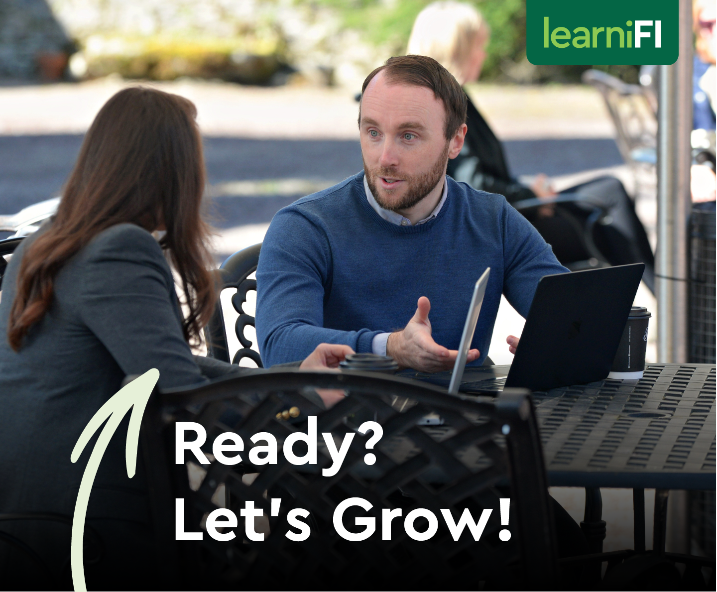 A corporate meeting outside and text that reads ready lets grow