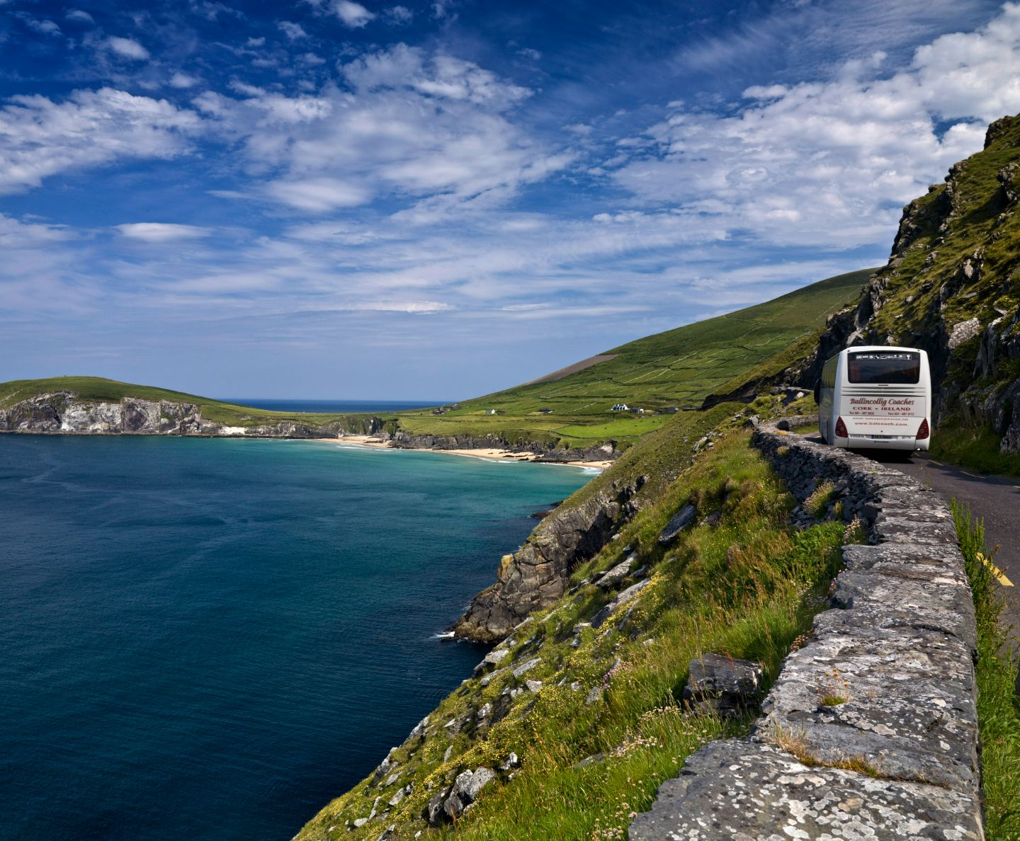 A bus going along a winding road