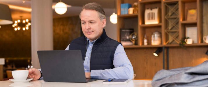 Man working on laptop.