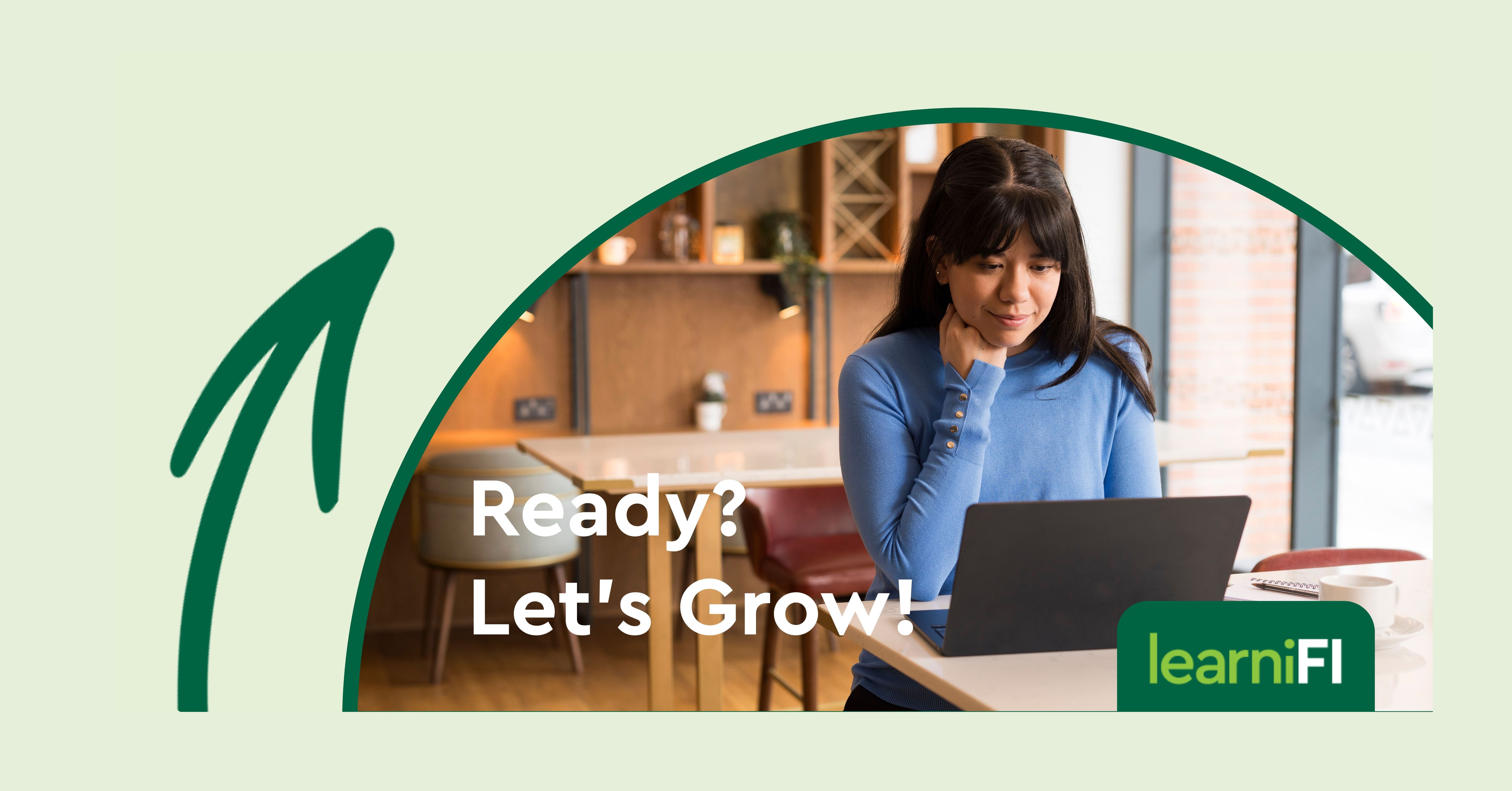 girl sitting at desk working on laptop
