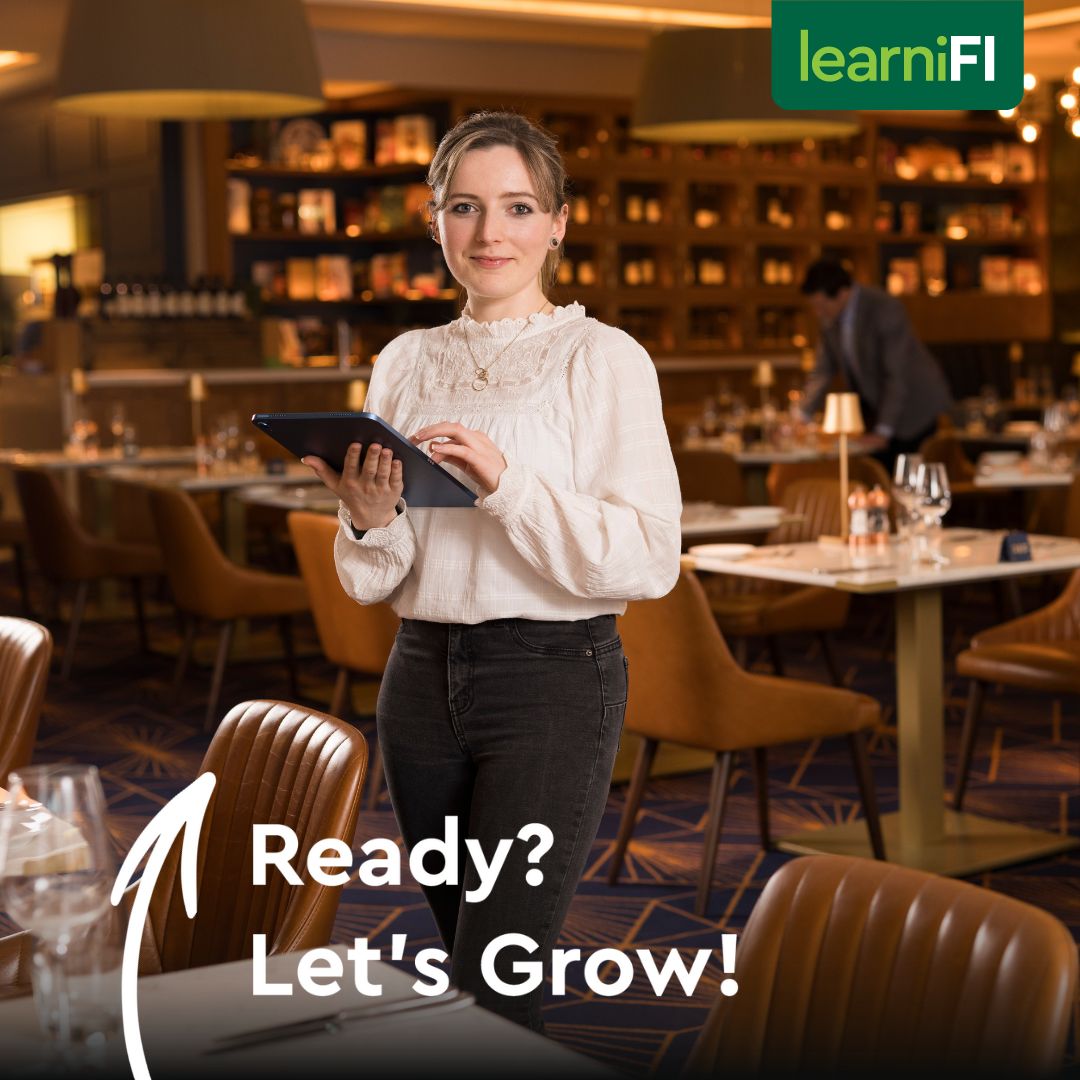 Woman holding tablet. Text reads: Ready? Let's Grow.